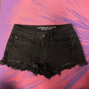 Low-rise black denim cut-off shorts